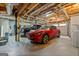Spacious two car garage with a red Mustang Mach-E and a black Ford pickup truck at 614 Highway 85 Conn, Brooks, GA 30205