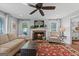 Inviting living room with fireplace and comfortable seating at 614 Highway 85 Conn, Brooks, GA 30205