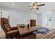 Spacious office features a large desk, comfortable chair, and a beautiful rug at 614 Highway 85 Conn, Brooks, GA 30205
