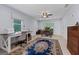 Well-lit office features large windows, and a beautiful rug at 614 Highway 85 Conn, Brooks, GA 30205