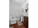 Modern powder room with pedestal sink, shiplap wall detail, and elegant fixtures at 614 Highway 85 Conn, Brooks, GA 30205