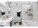 Neutral toned bathroom featuring a soaking tub and double vanity with plenty of storage at 103 Manx Dr, Grantville, GA 30220