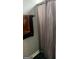 This bathroom features a shower with light gray shower curtain and towel rack with brown towel at 103 Manx Dr, Grantville, GA 30220