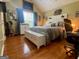 Spacious bedroom with hardwood floors, natural light, and a cozy atmosphere for relaxation at 103 Manx Dr, Grantville, GA 30220