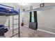 Spacious bedroom with LED lighting features a loft bed and guitar at 103 Manx Dr, Grantville, GA 30220