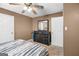 Bedroom features a dresser and a large closet with neutral paint at 103 Manx Dr, Grantville, GA 30220