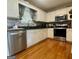 Modern kitchen with stainless steel appliances, granite countertops and ample cabinet space at 103 Manx Dr, Grantville, GA 30220