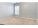 Bedroom with neutral walls, a window, and carpeted floors at 3313 Bethesda Ter, Acworth, GA 30101