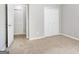 Bedroom with a double door closet and neutral walls at 3313 Bethesda Ter, Acworth, GA 30101
