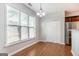 Sunlit breakfast nook features hardwood floors, a large window for ample light, and a closet for extra storage at 3313 Bethesda Ter, Acworth, GA 30101