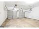 Spacious two-car garage with gray doors, offering ample parking and storage at 3313 Bethesda Ter, Acworth, GA 30101