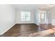 Spacious living room features light-filled windows and wood flooring at 3313 Bethesda Ter, Acworth, GA 30101