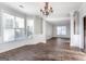 Elegant living room with hardwood floors, natural light, and a chandelier at 3313 Bethesda Ter, Acworth, GA 30101