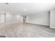 Unfinished basement with light-colored wood floors, a large area, and recessed lighting at 8069 Louis Dr, Locust Grove, GA 30248