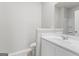 Bathroom features white cabinets, granite counters, sink and tile flooring at 8069 Louis Dr, Locust Grove, GA 30248