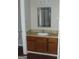 Bathroom vanity with updated countertop, sink, mirror and lighting at 1023 Falling Water Se Dr, Smyrna, GA 30080