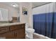 Bathroom featuring granite countertop, tile floors and bathtub/shower combination at 335 Discovery Lake Dr, Fayetteville, GA 30215