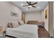 The bedroom features a seating area and a light colored shag rug over hardwood floors at 335 Discovery Lake Dr, Fayetteville, GA 30215