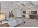 Large main bedroom boasts carpeted floors, closet, and private entrance to the en-suite bathroom at 335 Discovery Lake Dr, Fayetteville, GA 30215