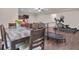 A combined recreational and dining area includes an exercise area, seating and dining at 335 Discovery Lake Dr, Fayetteville, GA 30215
