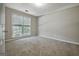 Bright bedroom with natural light from the large window and neutral decor at 250 Kari Glen Dr, Fayetteville, GA 30215