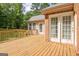 Well-maintained wooden deck with ample space for grilling and entertaining at 250 Kari Glen Dr, Fayetteville, GA 30215
