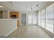Bright eat-in kitchen featuring tile flooring, lots of light, and natural-finish wood cabinetry at 250 Kari Glen Dr, Fayetteville, GA 30215
