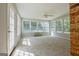 Inviting sunroom features multiple windows and natural light streaming in at 250 Kari Glen Dr, Fayetteville, GA 30215