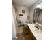 Bathroom with shower and tub combination featuring a large mirror and vanity at 4092 River Mist Ct, Lithonia, GA 30038