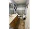 Bathroom with a vanity, toilet, patterned shower curtain, and tiled floors at 4092 River Mist Ct, Lithonia, GA 30038