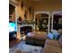 Spacious living room features a fireplace, elegant archways, and a comfortable sectional at 4955 Highland Lakes Dr, South Fulton, GA 30349