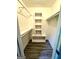Organized closet features built-in shelving, ample storage space, and wood-look floors at 2204 Liberty Sw Ln, Conyers, GA 30094