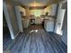 Modern kitchen with white cabinets, stainless steel appliances, and backsplash at 2204 Liberty Sw Ln, Conyers, GA 30094