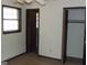 This bedroom features neutral walls, window, and a closet at 7225 Pineneedle Sw Dr, Covington, GA 30014