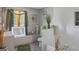 Bright bathroom featuring a shower and decorative wallpaper at 1401 Aberdeen Ct, Mcdonough, GA 30253