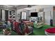 Finished garage with epoxied floor and painted walls offering potential as a flexible recreation or living space at 1401 Aberdeen Ct, Mcdonough, GA 30253