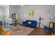 Open living room featuring contemporary decor with lots of light and plenty of comfy seating at 1401 Aberdeen Ct, Mcdonough, GA 30253