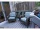 Outdoor deck with seating offers a cozy spot to relax, complemented by sliding glass doors for easy access at 2566 Summit Cove Dr, Duluth, GA 30097