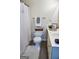 Bright bathroom with toilet, shower with curtain, and sink with decor at 2566 Summit Cove Dr, Duluth, GA 30097