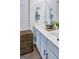 Bathroom features a double sink with blue vanity and modern fixtures at 2566 Summit Cove Dr, Duluth, GA 30097