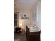 Bedroom highlighting a changing table, decor, and a cozy setup for a baby's room at 2566 Summit Cove Dr, Duluth, GA 30097