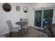 Cozy breakfast nook with a small table and chairs, adjacent to a patio with outdoor seating at 2566 Summit Cove Dr, Duluth, GA 30097