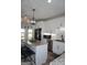 Bright kitchen with granite counters, stainless steel appliances, and a large island with seating at 2566 Summit Cove Dr, Duluth, GA 30097