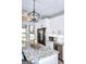 Contemporary kitchen featuring an island with granite counters, stainless steel appliances and modern fixtures at 2566 Summit Cove Dr, Duluth, GA 30097