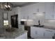 Bright kitchen with granite counters, stainless steel appliances, and a large island at 2566 Summit Cove Dr, Duluth, GA 30097