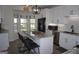 Bright kitchen with granite counters, stainless steel appliances, and a large island with seating at 2566 Summit Cove Dr, Duluth, GA 30097