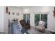 Well-decorated living room with sliding glass doors, comfortable seating, and a dining area in view at 2566 Summit Cove Dr, Duluth, GA 30097