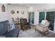 Cozy living room with a dining area, comfortable seating, and a sliding glass door to the outside at 2566 Summit Cove Dr, Duluth, GA 30097