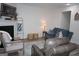 Spacious living room with cozy seating, a fireplace, and stylish decor for a comfortable atmosphere at 2566 Summit Cove Dr, Duluth, GA 30097