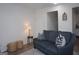 Cozy living room with a blue sofa, decorative pillows, and stylish accents at 2566 Summit Cove Dr, Duluth, GA 30097